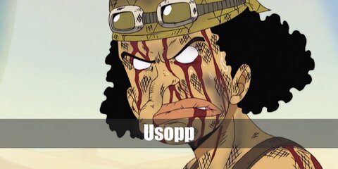 Usopp wears a bib overall, boots, and a bandana. He also has braided hair and a long nose.