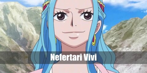 Nefertari Vivi'scostume can be recreated with a white dress, pink cape and drape, a blue wig, and gold accessories.