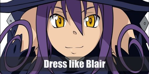 Blair's costume includes a halter top and skirt, thigh-high boots, elbow sleeves, and a witch's hat. She also has a round pendant on her neck and purple hair.
