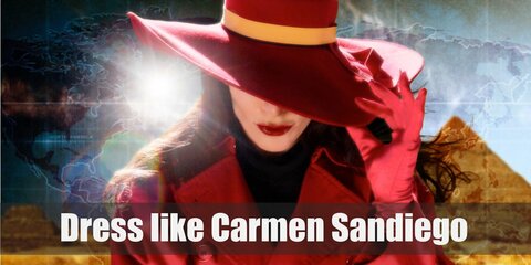 Carmen Sandiego costume a red trench coat over a black outfit, yellow scarf, black gloves and boots, and a red fedora hat.