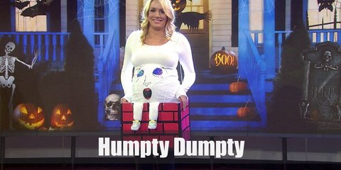 Humpty Dumpty’s costume includes an egg-shaped mask and a fat suit. Wear a plaid button down and striped pants. Complete the look with black dress shoes.
