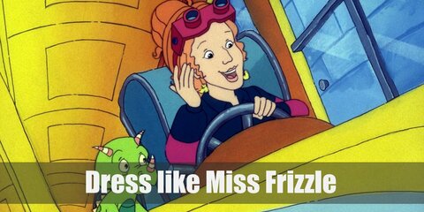 Miss Frizzle’s costume consists of a very unique blue dress covered in items you would find in space, a green lizard toy as your pet, some bright red heels, and a statement-making orange wig.