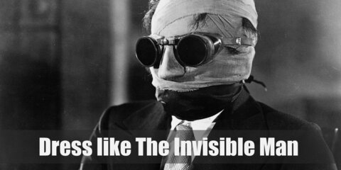 The Invisible Man costume is a white buttoned-down shirt with a black necktie, black slack pants, a brown leather trench coat, brown leather gloves, black sunglasses, a brown hat, and black leather shoes.