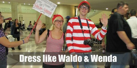 Waldo and Wendo costume is white and red striped sweaters and bobbled hats. For Wenda, a blue denim skirt with long tube socks matching the sweater and for Waldo: blue jeans. Both Waldo and Wenda wear brown loafers.