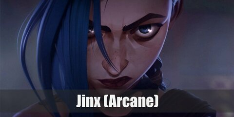 Jinx' costume features a crop top and colored pants. She styled it with boots, a belt, and fingerless gloves, too. Complete the costume with a braided blue wig and a toy gun.