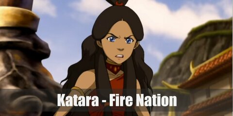  Katara’s costume is a one-shoulder, bow crop top, brown pants with a red skirt over the top, golden arm bracelets, golden gauntlets, and a different hairstyle.