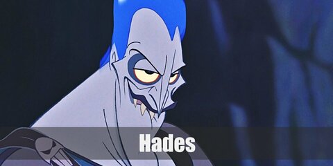 Hades’ costume is a dark grey shirt, black fabric, black sandals, a skull brooch, and a blue wig.