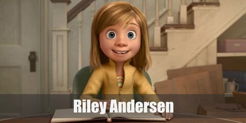 Riley wears a rainbow shirt topped with a yellow cardigan and brown pants. She also has short hair and a pair of red sneakers.