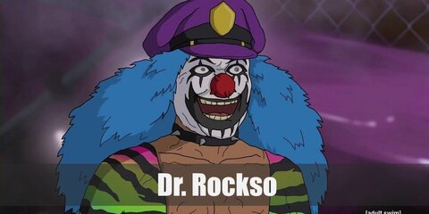  Dr. Rockso’s costume is  a neon green full body suit with the front cut out, neon pink leg warmers, pink shoes, spiked bracelets and collar, a blue wig and clown face make-up.
