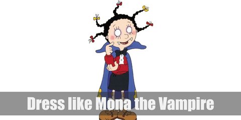  Mona the vampire costume is a white button-down shirt, a red cardigan, a black mini skirt, a pair of white crew socks, brown Oxfords, and a purple cape. Her hair is also done in multiple braids. 
