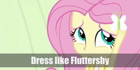  Fluttershy costume is a white tank top paired with a light green midi skirt, and light green boots. She is also known for her bubblegum pink hair, yellow wings, and light yellow skin.  