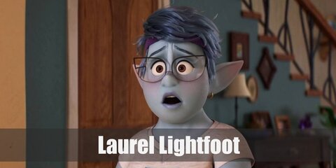 Laurel Lightfoot’s costume is a cream woolen sweater, blue jeans, black cat-eye glasses, small gold earrings, and purple shoes.