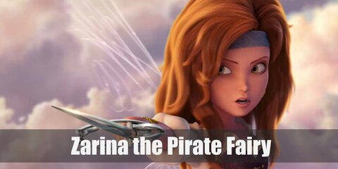 Zarina The Pirate Fairy wears a white top and corset styled with a skirt and a pair of boots. She also wears a headband and has red hair.