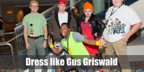 Gus Griswald’s school outfit is reminiscent of a military uniform consisting of mostly greens and browns.