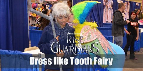 To make a tooth fairy costume, you'll need a lot of feathery head gear, fairy wings, and a blue-green dress and tights as well as a couple more colorful and bright accessories