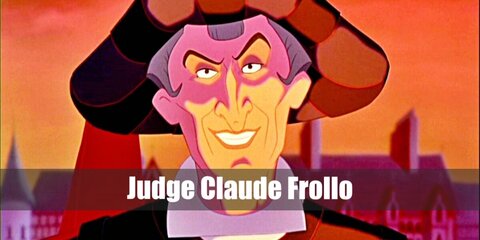 Judge Claude Frollo’s costume is black robes with purple details, a white collared top, and a large purple and red headpiece.