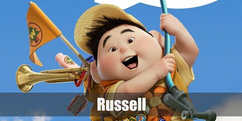 Russell’s costume is a yellow button-down shirt, brown shorts, white crew socks, brown shoes, a yellow cap, an orange scarf, and tons of Junior Wilderness Explorer badges.
