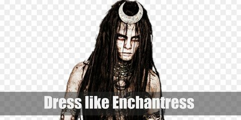 Enchantress costume is a strapless bra with dark shorts, the crescent moon headpiece, a metal necklace, metal armbands with chains, and a metal belt.