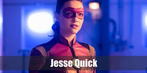 Jesse Quick's costume can be recreated with matching leather burgundy jacket and pants. Add in The Flash's sticker at the chest. Then finish the costume with burguny gloves, boots, and red eye mask.