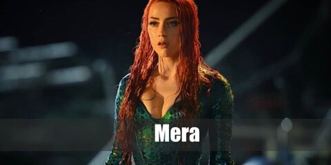 Mera’s costume features a scaly green bodysuit and a red wig.