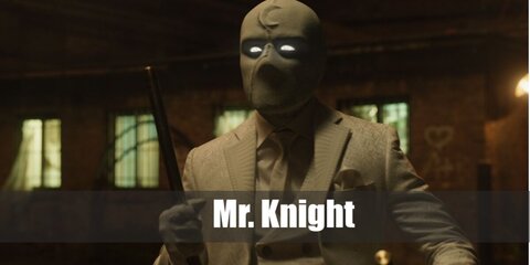 Mr. Knight costume is this all-white look with a full head mask, white shirt, tie, and suit with pants. Complete the look with white shoes, too. 