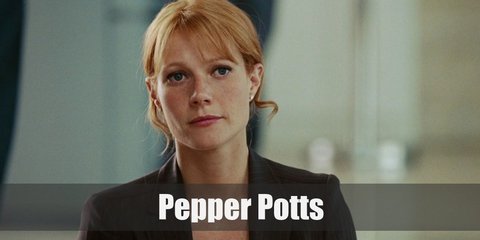 Pepper Potts’s costume is a white button-down shirt, a black blazer, a black pencil skirt, and a Bluetooth earpiece.