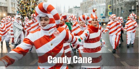 Start off the outfit with a full candy cane costume or make it more practical with a red-and-white striped outfit topped with a matching hat.