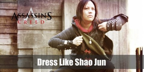 Shao Jun - a fearless sword swinging assassin, wears a deep brown hooded coat with red silk trim and a mandarin collar