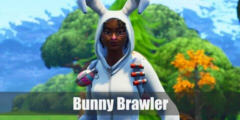 Bunny Brawler's costume can be recreated with a bunny-inspired onesie or hoodie. Then rock the total bunny look with a pair of cute slippers. Carry a pink and blue blackpack decorated with red toy bullets.