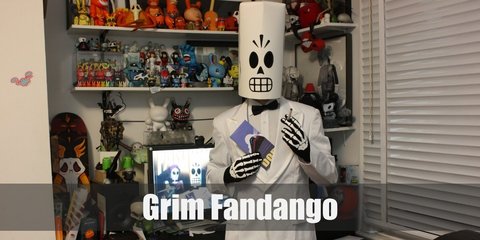 Manny Calavera (Grim Fandango) costume a big white coat, white button down shirt, and bow tie, and black trousers. For his face, wear an elongated grim reaper mask or fashion one out of a cardboard.
