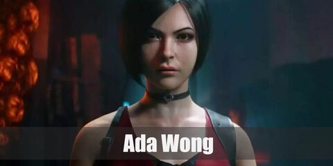 Ada Wong wears a red dress, a gun holster on her leg, and a choker. She has short, black pixie-cut hair.