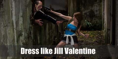 Jill Valentine costume is a bright blue strapless top with a white jacket tied over it, a black skirt, a gun holster harness, finger less gloves, and high boots.