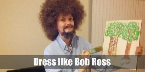  Bob Ross costume style is eclectic yet retro with his huge afro, light denim long-sleeved shirt, and denim pants.