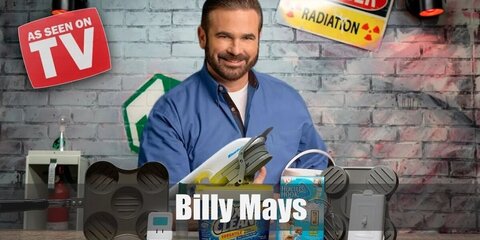 Billy Mays costume is a light blue button-down shirt with khaki pants. He also has a grown facial hair. Complete the costume by carrying an Oxiclean product. 