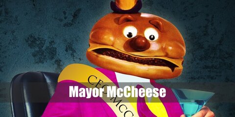  Mayor McCheese’s costume is a yellow button-down shirt, a maroon tailcoat, purple-striped pants, a purple sash, a cheeseburger mask, and a purple top hat.