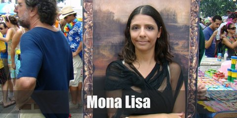  Mona Lisa costume is a green medieval dress, a brunette wig, and a little bit of DIY-ing.