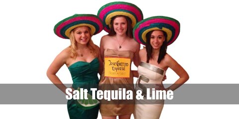  Salt, Tequila, and Lime’s costume is a white dress with an ‘S’ on it for Salt, a beige dress with a print of a tequila bottle on it for Tequila, and a light green dress with lime wedge earrings for Lime.