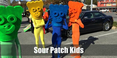 Sour Patch costume is wearing a solid-color ensemble. Carve the shape of a Sour Patch Kid's shape out of a felt sheet then stick it to an eyeglass frame to wear as a festive mask. 