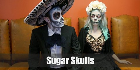 For sugar skull costume, aside from drawing a skull on their face, women wear slightly gothic-themed dresses and beautiful floral headbands. Men, on the other hand, wear much simple clothing of black suits. 