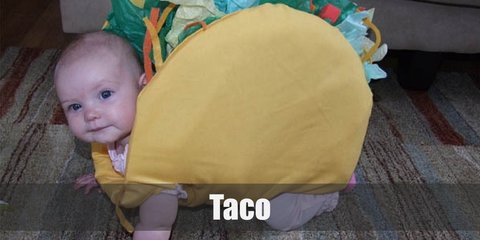 Baby or Child Taco's costume includes a taco shell foam body with green, blue, white, red, and yellow pieces of cloth. Wear a taco hat to complete the look. 