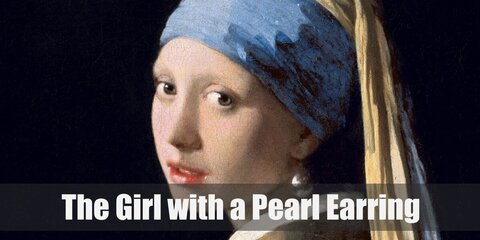 The Girl with a Pearl Earring's Costume can be recreated with a peasant dress with white lining, a yellow hair scarf, a blue headband, and a large pair of pearl earrings.