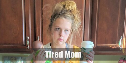 Tired Mom costume can be recreated by mixing and matching pieces from your daily wardrobe such as an oversized shirt, leggings, boots, and a tote bag. Wear your hair in a messy up-do and get dark eye-shadow to pull off the haggard look.