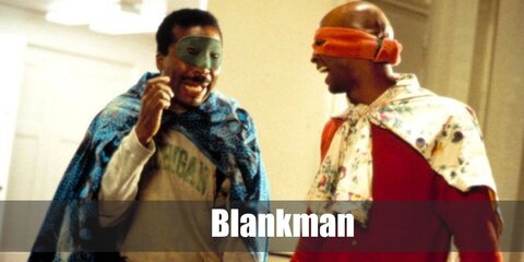 The Blankman costume features a red coverall, yellow gloves, and a mask. He also has floral cape.