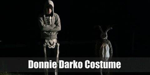 Donnie Darko costume is a skeleton full body suit with a gray hoodie over the top. This costume is very simple and fits his moody-don’t care-troubled teenager attitude.