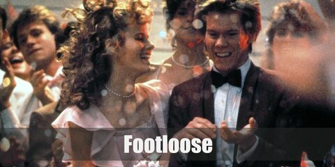 Ren McCormack costume from Footloose is a maroon jacket with a white shirt and black pants. He styles it with dark shoes and a cool mullet.