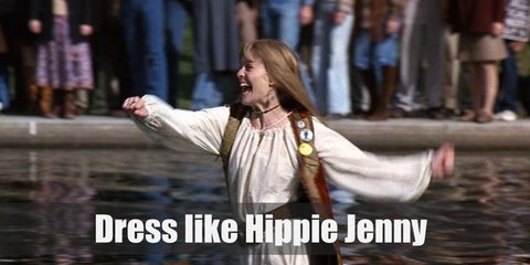 Hippie Jenny wears a loose cotton dress topped with long brown vest, a brown belt, brown suede boots, and many accessories.