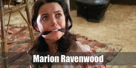 Marion Ravenwood's costume can be recreated with a long-sleeved top with red lace accents. Pair it with red pants with a black waist cinch belt.