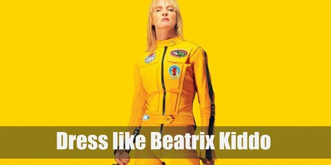 Beatrix Kiddo wears a bright yellow with black stripe long-sleeved shirt with matching sweatpants, a yellow motorcycle jacket, and a pair of yellow sneakers.