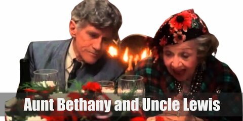 Aunt Bethany's clothing features a patterned dress topped with an animal print coat, hat and various necklaces. Uncle Lewis' wears a formal coat and tie.