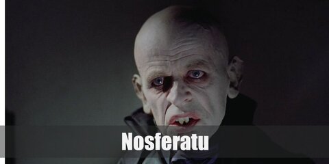 The Nosferatu costume features a dark long coat with pants, a scary mask, and monster hands for gloves.